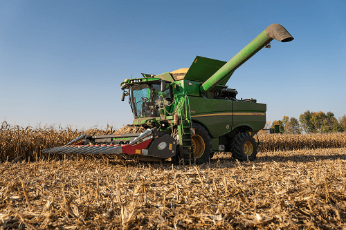 Mähdrescher John Deere S 770i mit Domioni Pflücker